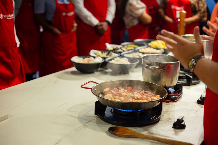 Chef teaching another cook